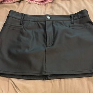 Chic Black Faux-Leather Mini Skirt with Patch Pockets